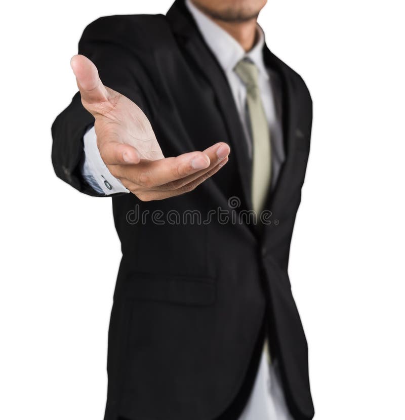Businessman holding open hand, giving showing concept stock photo