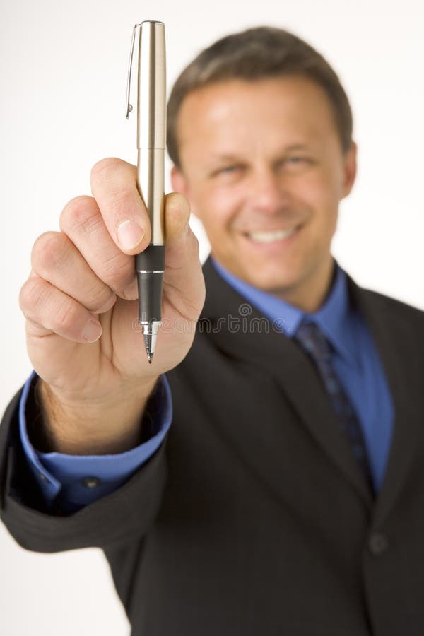 Businessman Holding A Pen stock image Businessman Holding A Pen stock image