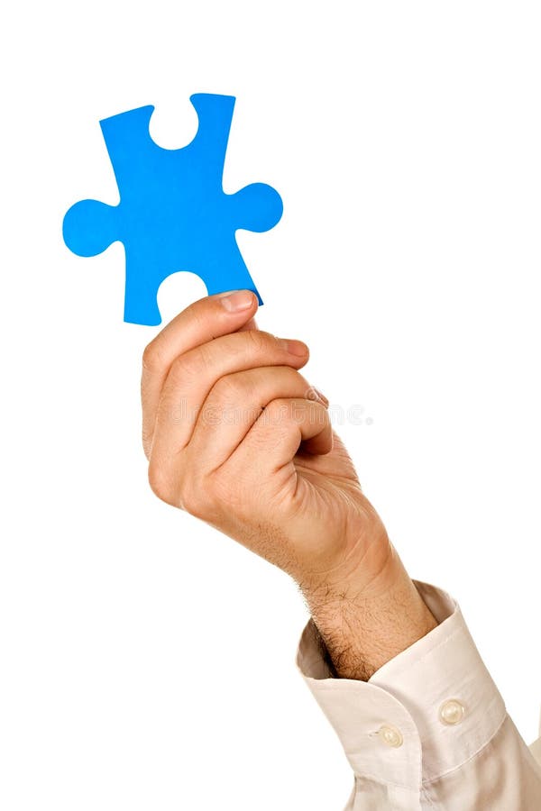 Businessman Holding A Piece Of Puzzle Stock Image Image Of Holding