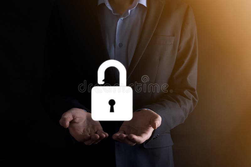 Businessman holds an open padlock icon on his palm. unlocking a virtual lock. Business concept and technology metaphor for cyber royalty free stock photos