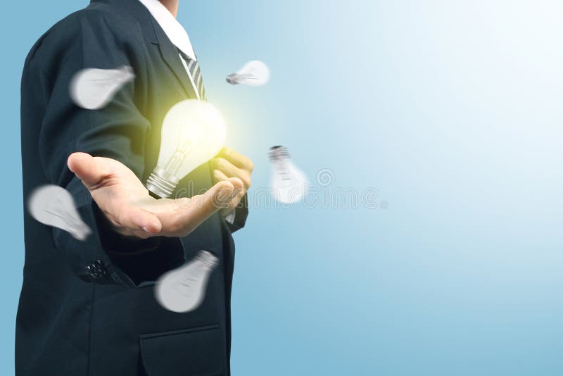 Businessman with illuminated light bulb stock illustration