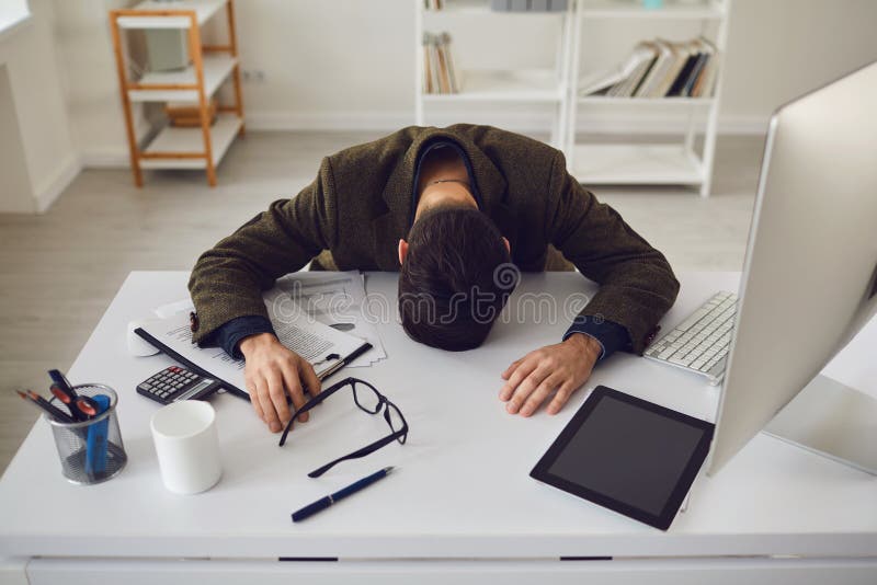 Businessman Tired Exhausted with Stress Problems Lying at the Workplace in  the Office. Stock Photo - Image of business, overwork: 182829448