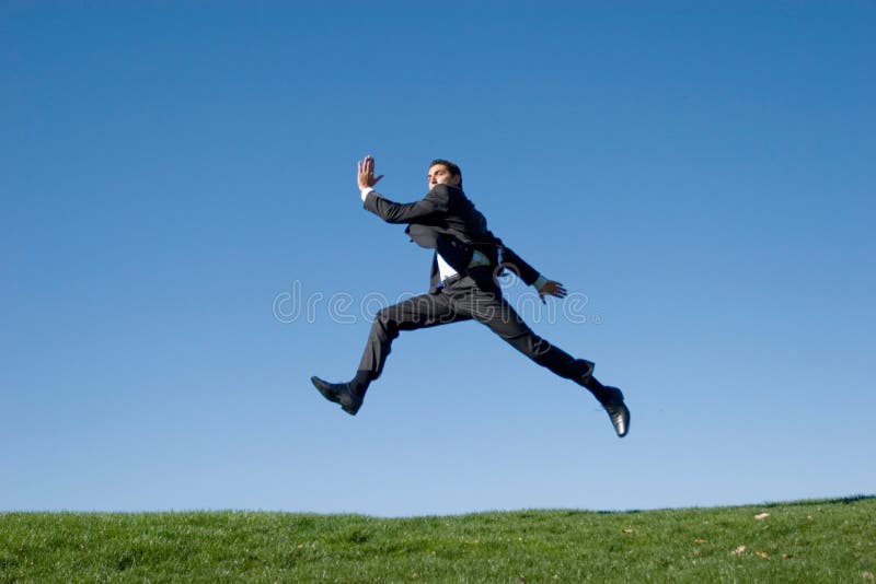 Businessman jumping