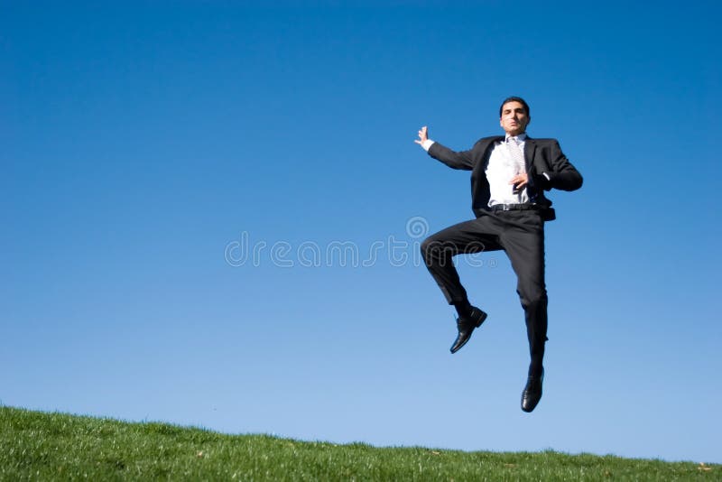 Businessman jumping