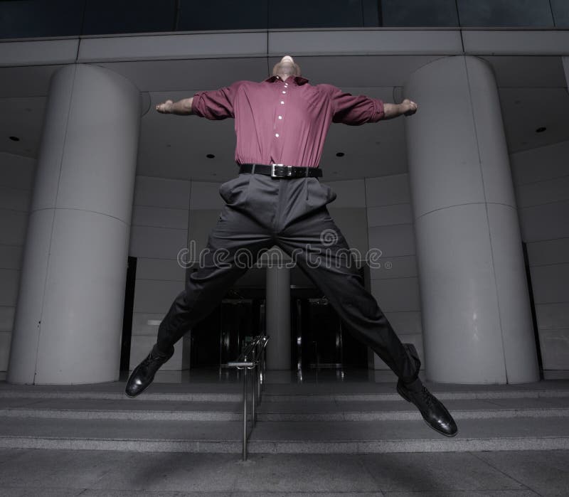 Businessman jumping for joy