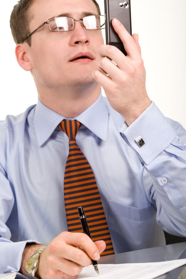 Businessman looking at cellphone