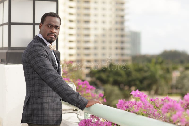 Businessman looking over his shoulder stock photos Businessman looking over his shoulder stock photos