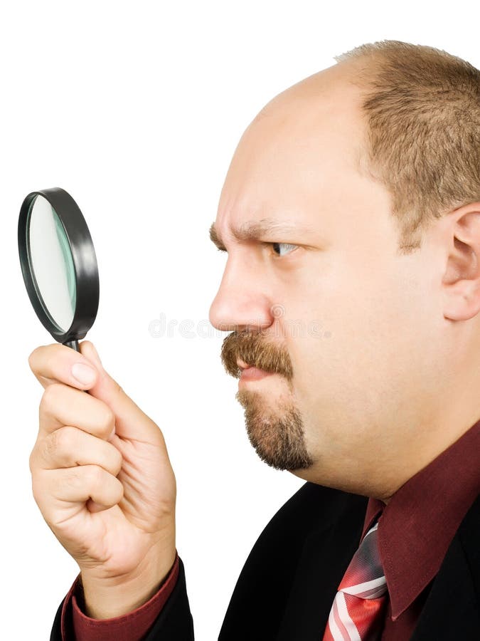 Businessman with magnifying glass stock photos Businessman with magnifying glass stock photos