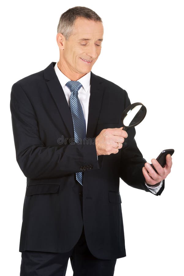 Businessman with Magnifying Glass and Mobile Phone Stock Image Image