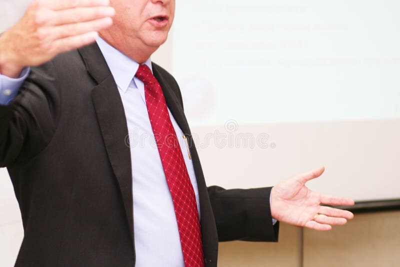 Businessman makes speech in the boardroom