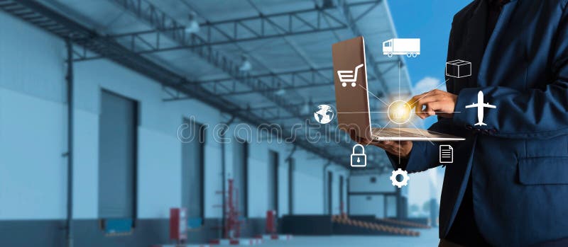 Businessman manager using laptop check orders online goods worldwide for network with Modern Trade warehouse logistics. Industry of logistics network concept