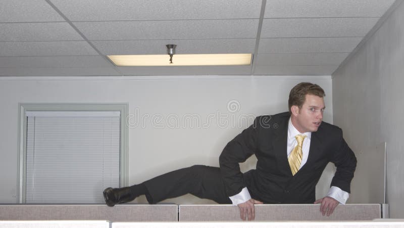 Businessman over cubicle