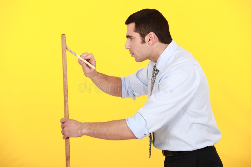 Businessman painting stock image. Image of pattern, holding 29642195