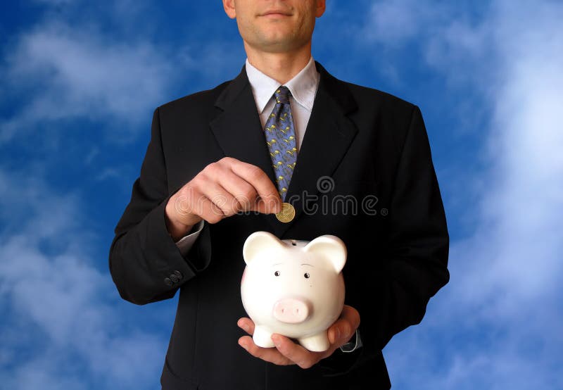 Businessman With Piggy Bank