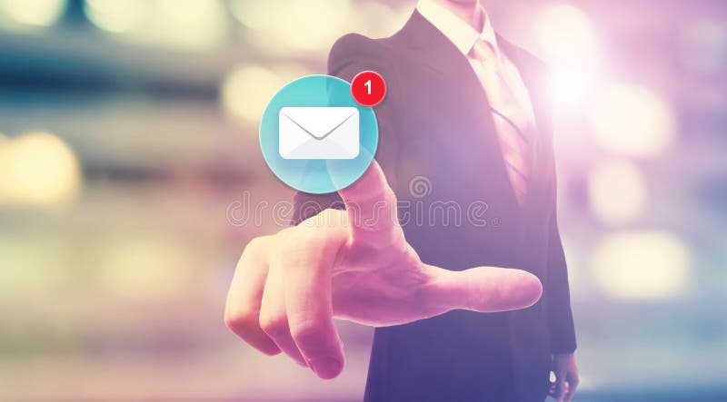 Businessman pointing at email icon