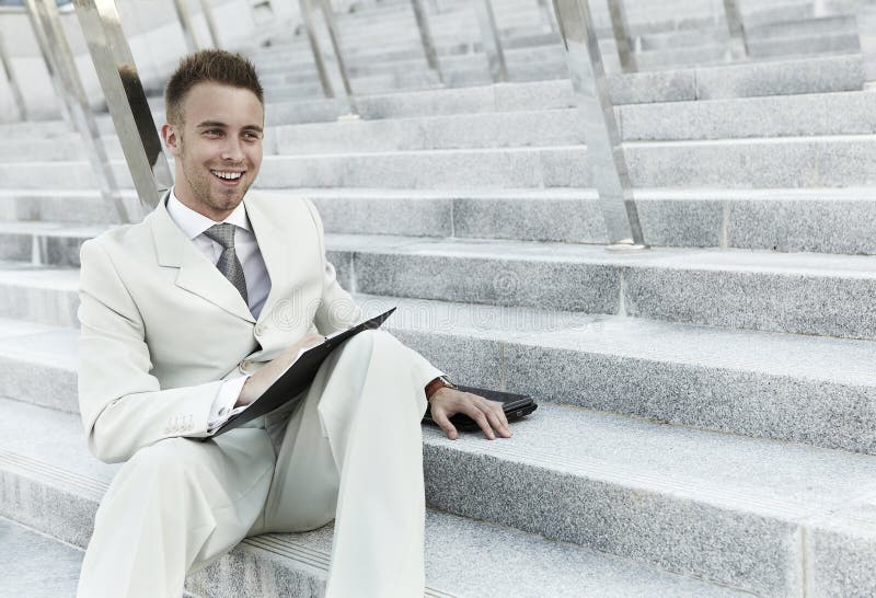 Businessman portrait on stairs