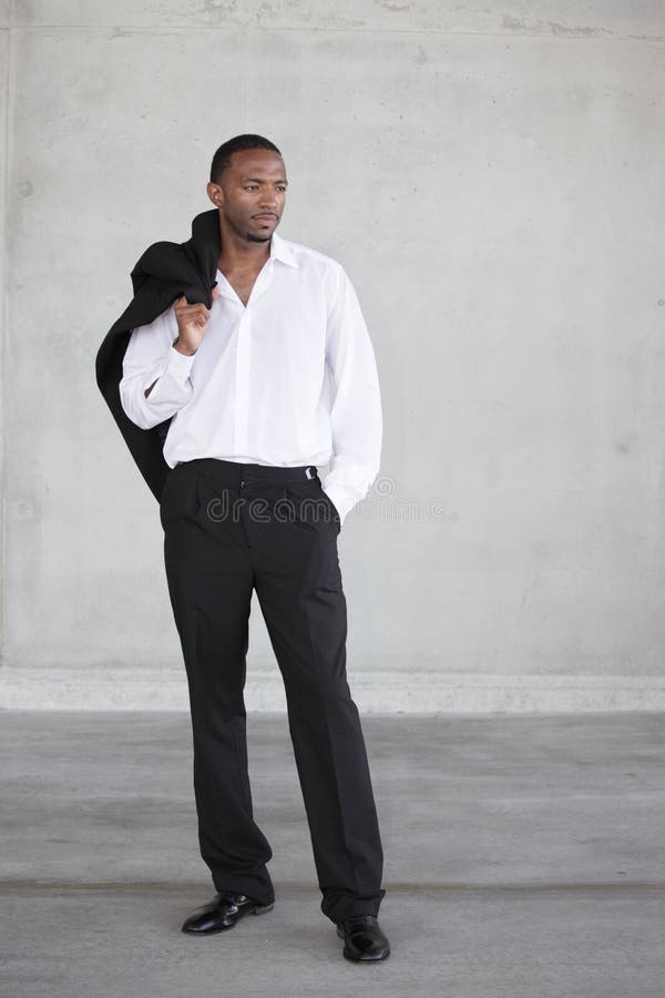 Businessman Posing with Jacket Over His Shoulder Stock Photo - Image of ...