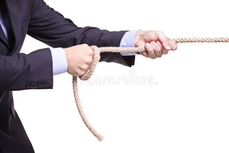 Businessman pulling a rope isolated on white background. Male hand holding businessman stock images, royalty-free photos and pictures