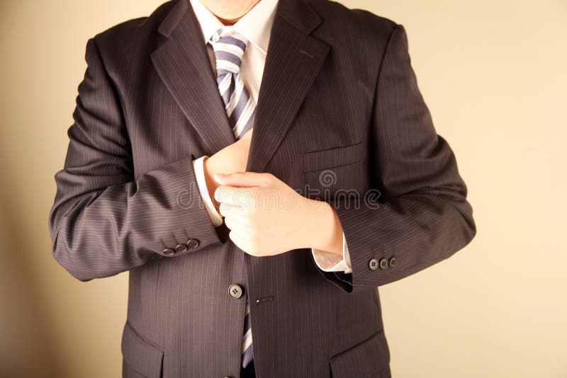 Businessman Reaching Inside Pocket Stock Photos Free & RoyaltyFree