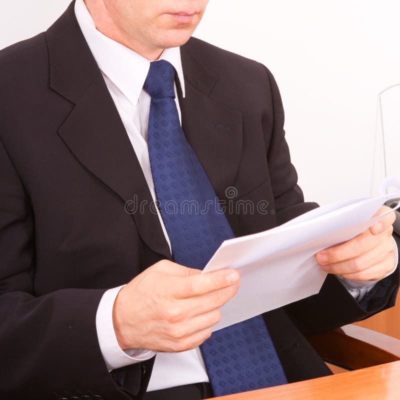 Businessman reading a letter. stock image