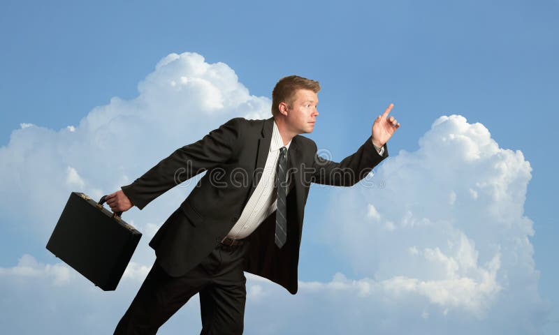 Businessman running stock photography