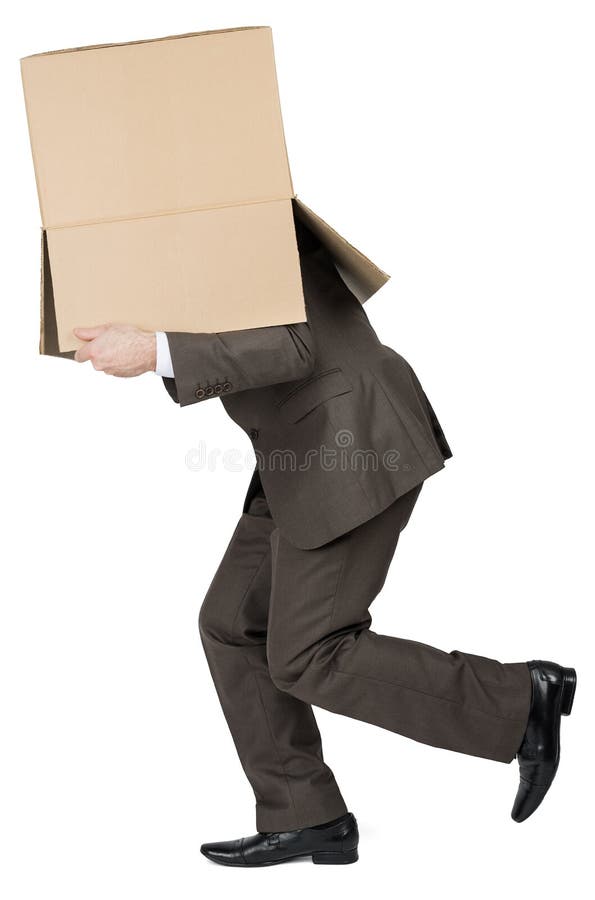 Businessman running with brown box on his head royalty free stock photos