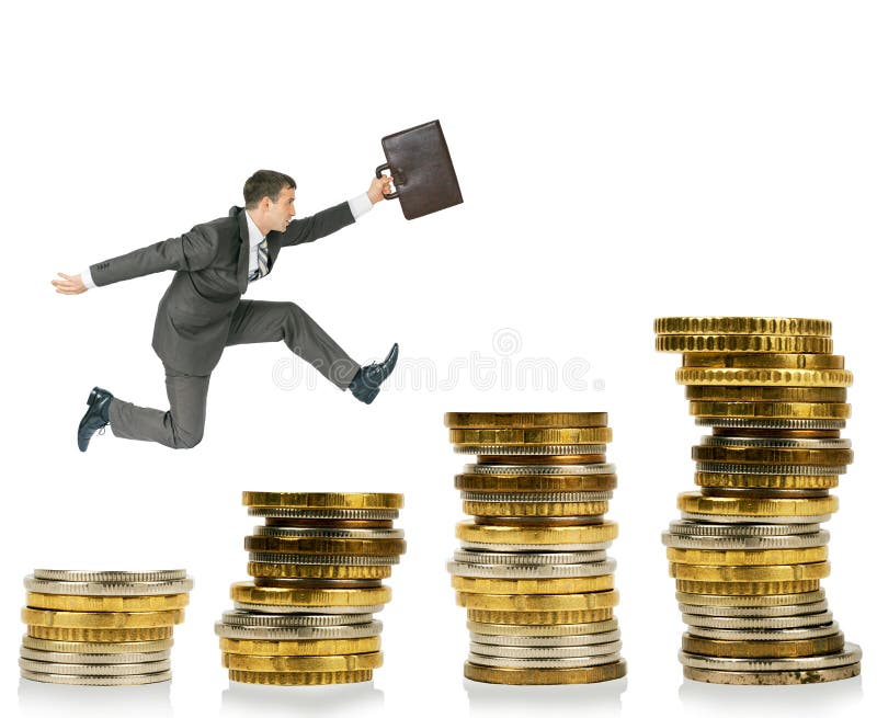 Businessman running on gold coins stock photos