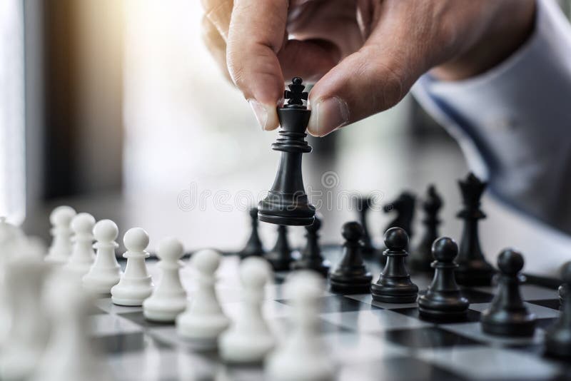 Businessman`s Hand Playing Chess Game To Development Analysis Ne Stock  Photo - Image of competition, business: 123928716