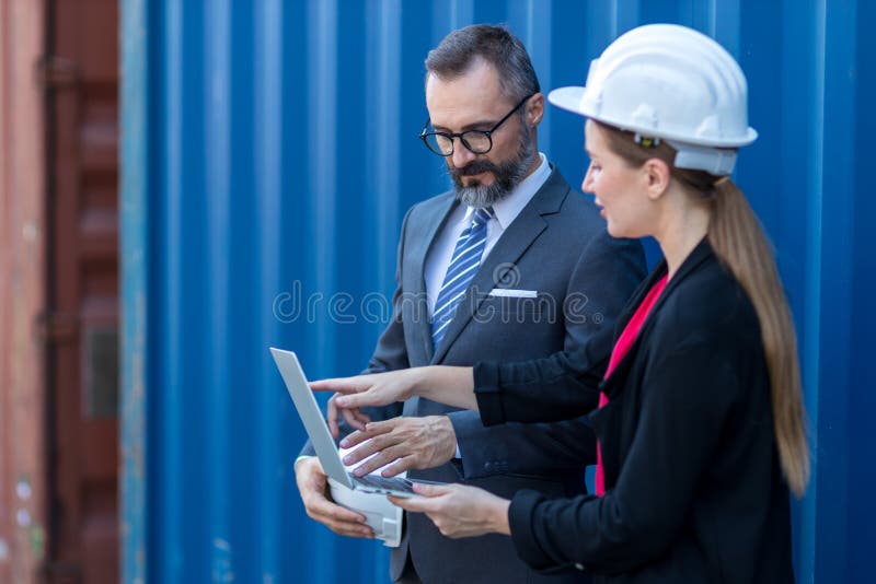 Businessman and Secretary Work at Container Cargo Site Check Up Goods