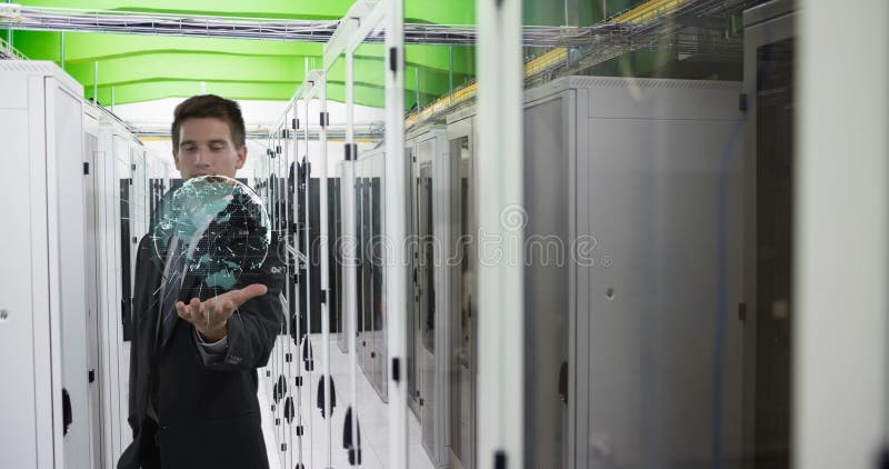 Businessman in server room interacting with digital globe hologram technology stock image