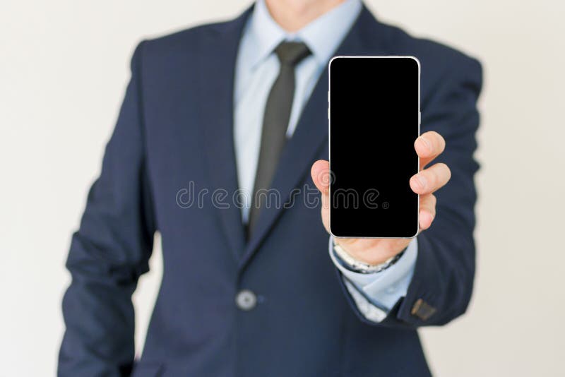 businessman show Facebook login page on his smartphone for using