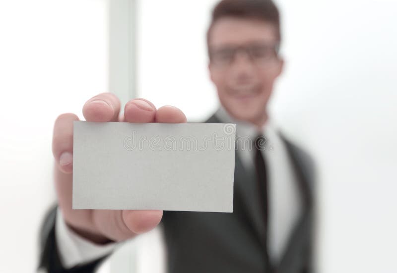 Businessman showing a blank business card royalty free stock photo Businessman showing a blank business card royalty free stock photo