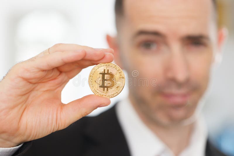 Bitcoin in the hand stock image. Image of market, coin - 114423541