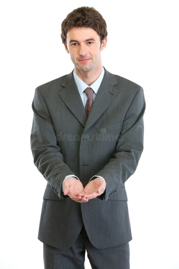 Businessman showing something on open palms stock photo Businessman showing something on open palms stock photo