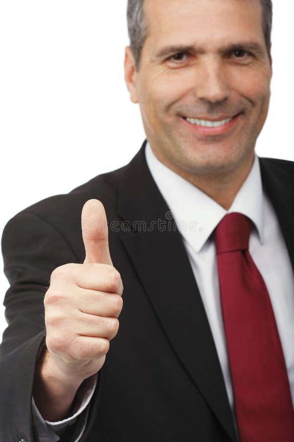 Businessman showing thumbs-up sign