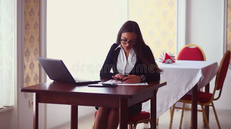 Businessman sideways woman sitting in cafe girl