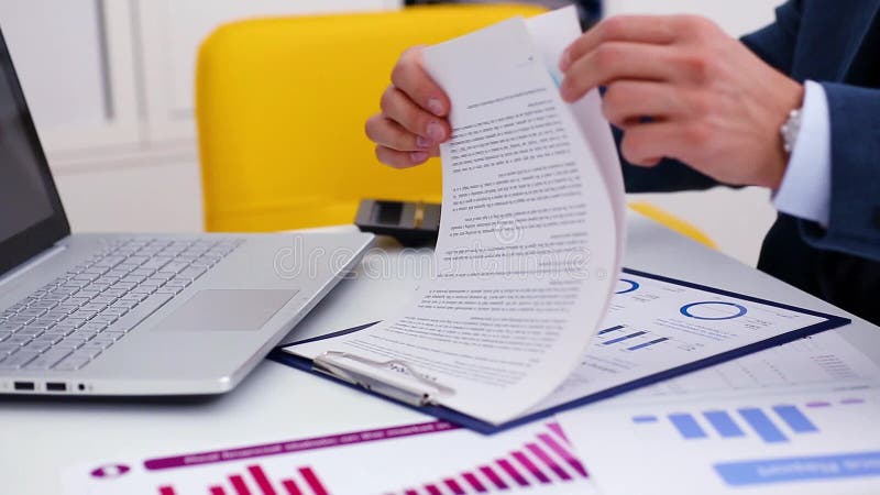 Businessman sign contract with a silver pen