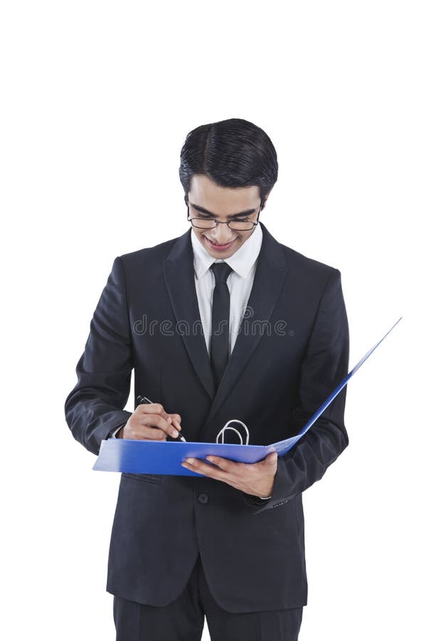 Businessman signing a document royalty free stock photos