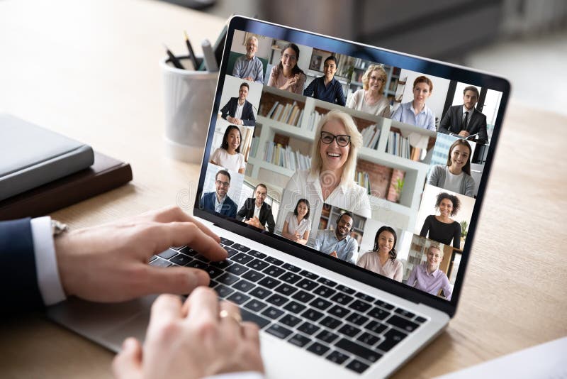 Diverse people engaged in group video call, computer monitor view royalty free stock images