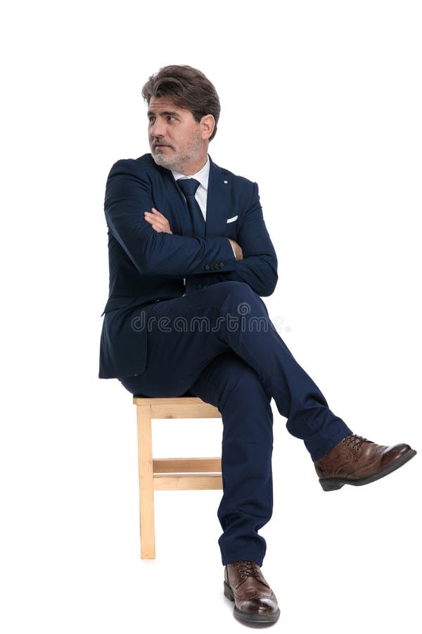 Man Sitting Chair Legs Crossed Stock Photos - Download 394 Royalty Free ...