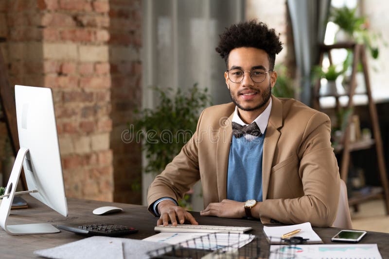 Businessman sitting at his workplace stock photo
