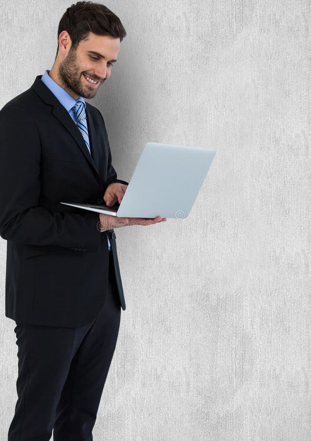 Businessman Smiling while Using Laptop Against Wall Stock Illustration