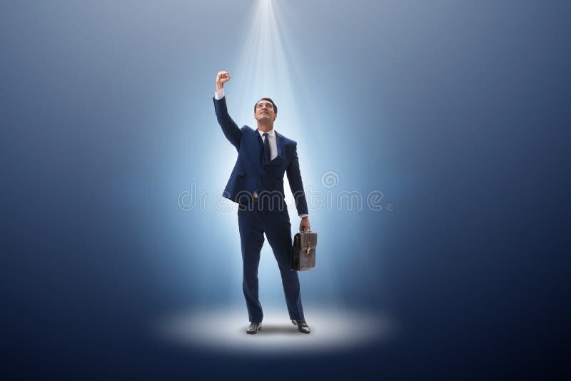The Businessman in the Spotlight in Business Concept Stock Photo