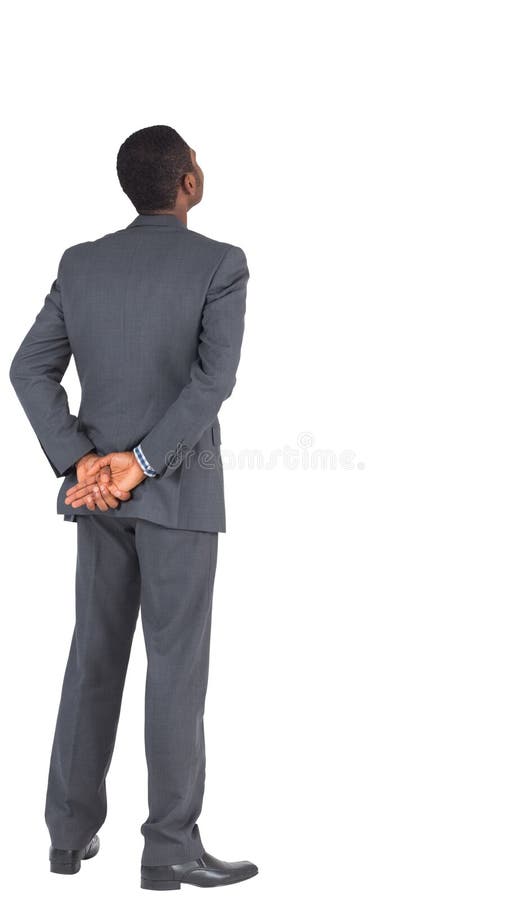 Businessman Standing with Hands Behind Back Stock Image Image of