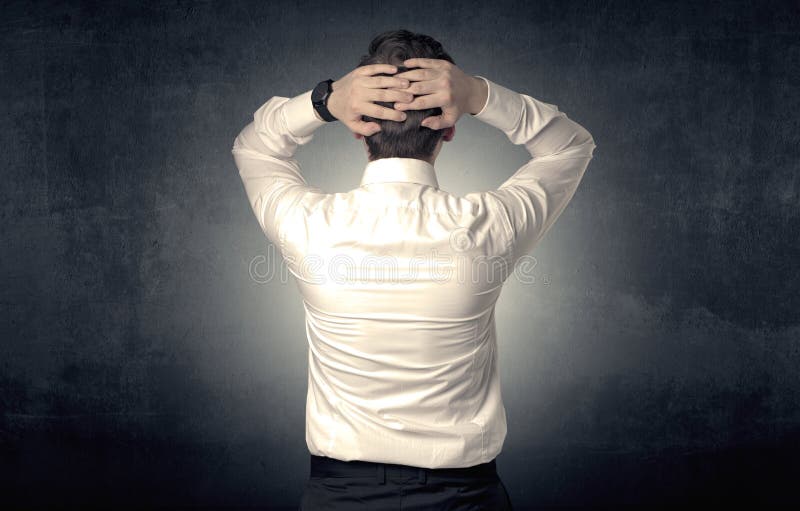 Businessman standing and thinking stock images Businessman standing and thinking stock images