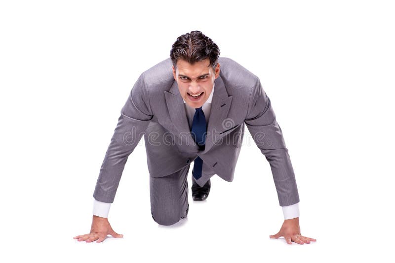 The businessman on start ready for running isolated on white royalty free stock images The businessman on start ready for running isolated on white royalty free stock images