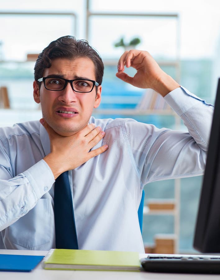 Businessman Suffering from Excessive Armpit Sweating Stock Photo