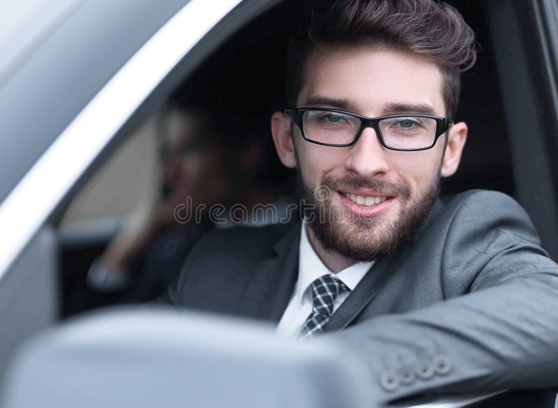 Businessman in suit driving his luxurious car. royalty free stock photos Businessman in suit driving his luxurious car. royalty free stock photos