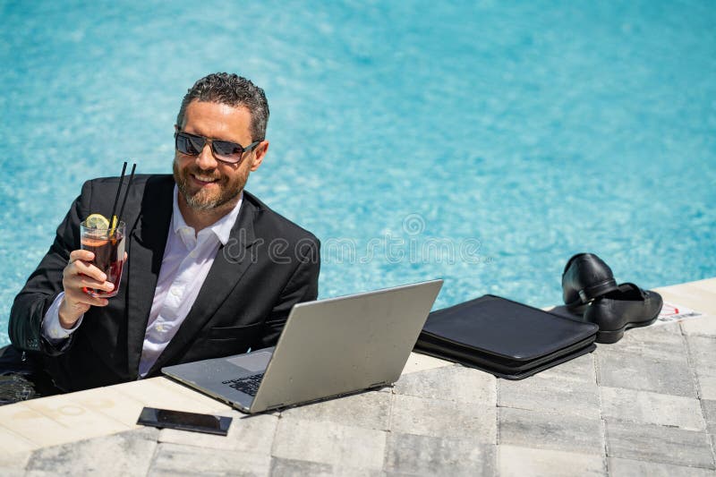 Businessman in Suit with Laptop in Swimming Pool. Crazy Business Man ...