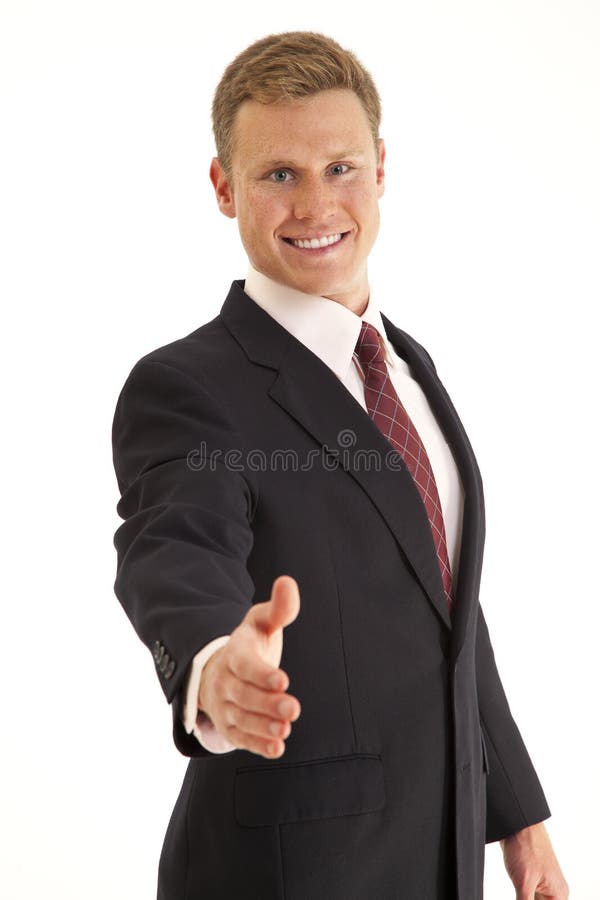 Businessman in suit ready for handshake royalty free stock images